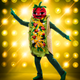 Illustration for article titled When you stare into The Masked Singer's creepy new smiling taco costume, it stares back into you